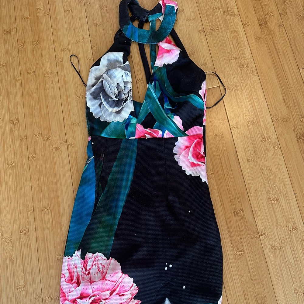 Floral and elegant dress knees length with side slit and halter neck